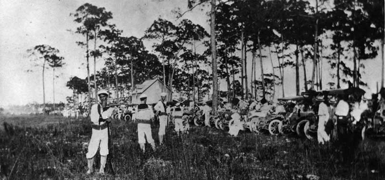 On the day of Miami’s first flight, local militia kept spectators off the landing field. July 20, 1911. Photo by B. Frank Davis. HistoryMiami, gift of Don Carson. 1973-002-17.