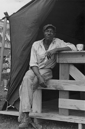 Black workers contributed to the farms' success. At first, African American seasonal laborers worked the fields. During World War II and until 1995, Blacks from the Bahamas and the Caribbean provided migrant labor. This view: Bahamian worker, ca. 1943. 1993-171-9