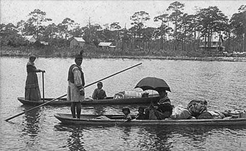 Seminoles traveled by dugout canoe from their homes in the Everglades to trading posts on the coast. They sold animal skins and feathers, and bought store goods, such as umbrellas, hats, and coffee pots. HMSF, gift of Elizabeth Gardner. 1997-505-1.