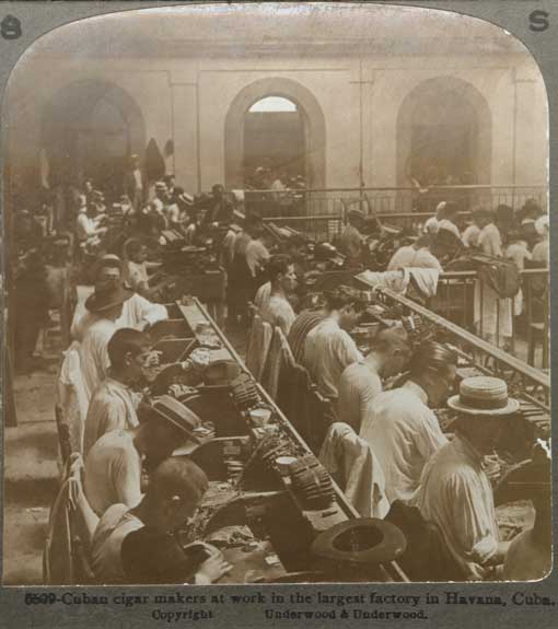 Cuban cigar makers at work in the largest factory in Havanna, Cuba. New York : Underwood & Underwood, [ca. 1910] Image number 2006-639-7