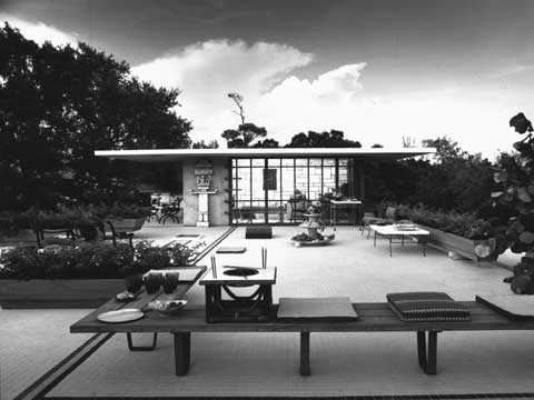 Alfred Browning Parker built this multi-level house for himself on the coral ridge in Coconut Grove, overlooking Biscayne Bay. He employed a system of concrete plates, which were molded from formworks lent by Rufus Nims. Louvered door panels opened the house to breezes, while the roof deck was used for family activities and parties. Parker's integration of local stone and wood into his design, along with his landscaping, created an organic quality similar to the houses of Frank Lloyd Wright. Parker won House Beautiful's 'Pacesetter' award in 1954 for this celebrated house. Courtesy of Smathers Libraries, University of Florida.