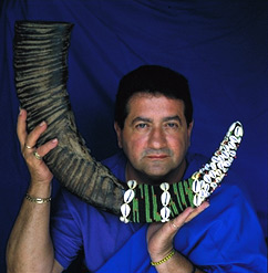 Carlos Leon with beaded horn for Ogún in his home, Miami. Photograph by Carl Juste.
