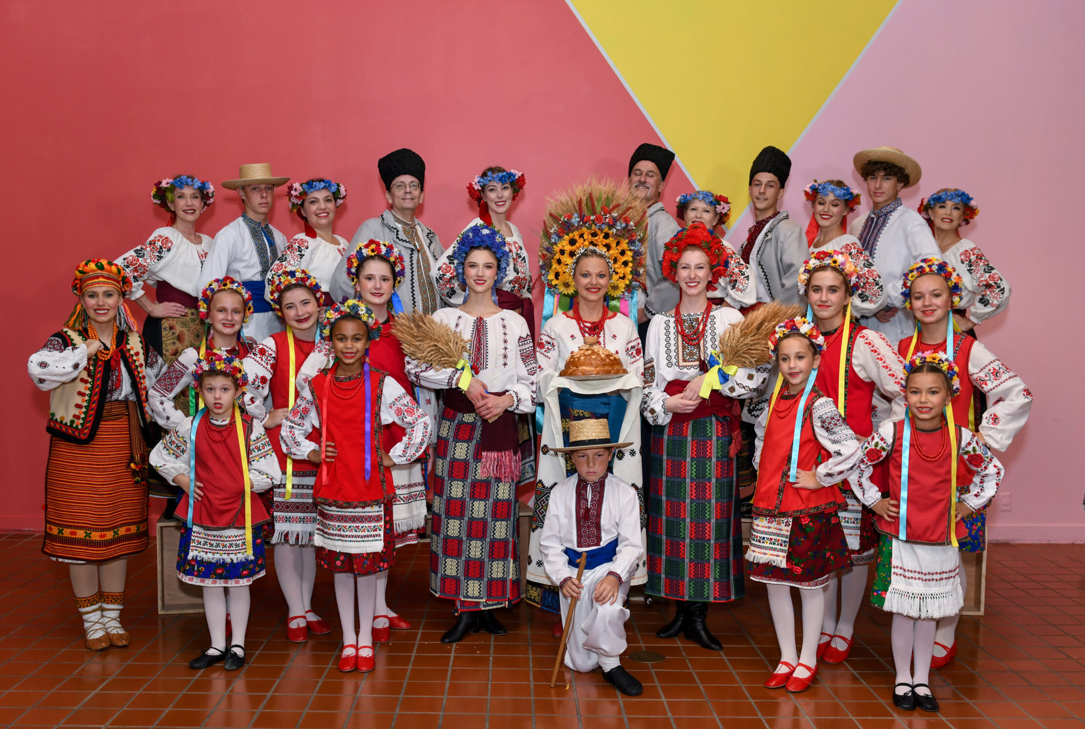 The Ukrainian Dancers of Miami pose for a photo in traditional costumes