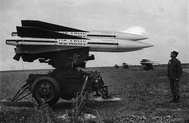 A soldier sizes up Hawk missiles at the base in Everglades National Park. March 1963. Miami News Collection, HistoryMiami. 1994-370-885.