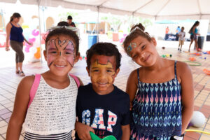 Children smiling with face painting
