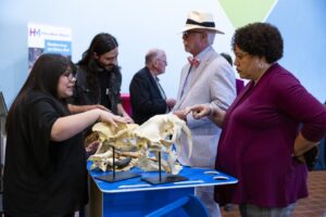 Members interacting with museum educator