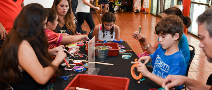group of young girls doing crafts
