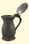Pewter baluster measure. 17th century. 17.0 x 14.0 cm. Institute of Jamaica, 2006.1.113 (R). This type of vessel was typically used to measure quantities of wine or ale in taverns.