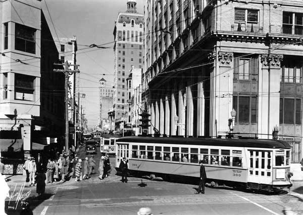 black and white image of trolley in old downtown Miami